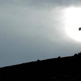 Muted Sun behind Vince's Cross