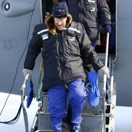 Sir Edmund Hillary Disembarking teh Plane on Arrival in Antarctica