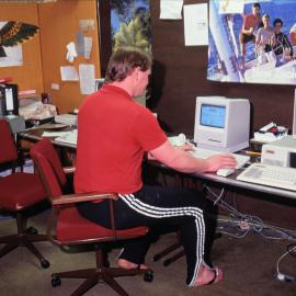 Alistair Gillespie at computer in lab, Scott Base