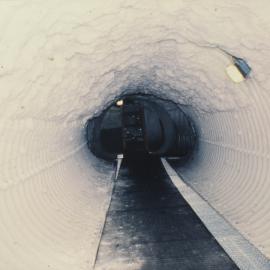 Access tunnels link living and scientific modules. Main tunnel 150m long, 2m high- now only 1.5m high (SANAE)