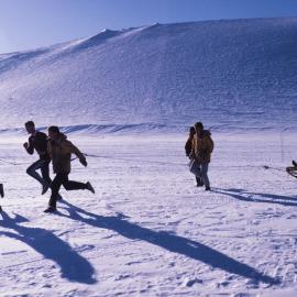 Scott Base manhauling sledge team in race VS Fishers