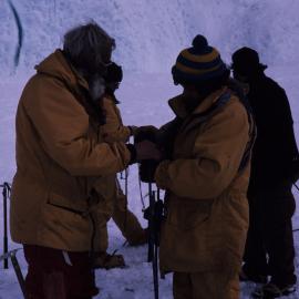 Walt Fowlie helps Steve Mosley rope up on survival training