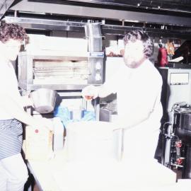 Mac McGregor and Steve Mosley making Christmas Cakes