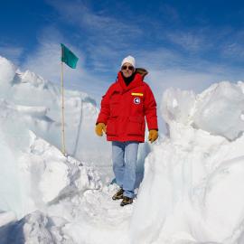 U.S. Secretary of State John Kerry walks through the zone where ice crashes into land outside Scott Base