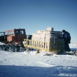 A weighty load! Tucker SnoCat vehicle pulling cargo