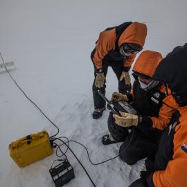 Scientists measuring properties of the Ross Ice Shelf
