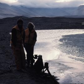 Malcolm MacFarlane & Mike Fraser prepare to pump water from Lake for domestic use, Vanda Station
