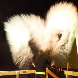 Alice throwing boiling water into the air