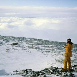 Looking down on tents and hut from near crater rim