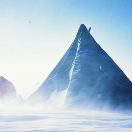 Tent & field man in blizzard