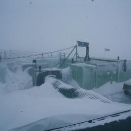 Scott Base from roof of ready use store, Blizzard, C-Hut & Post office