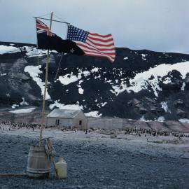 NZ and US Flags fly at Cape Adare