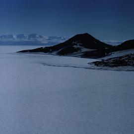 Pram Point (Scott Base) and Observation Hill, Royal Society Mountains in the distance