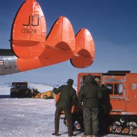 McMurdo Station-USN Lockheed R7V-1 Super Constellation 'Phoenix' (131624) being unloaded & Weasel