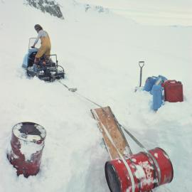 Extracting Fuel Drums from Pit 