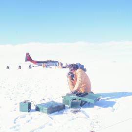 Ken Woolfe establishes radio communication after put-in on Darwin Glacier