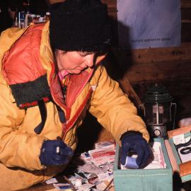 Wendy Strid checks the first aid kit in the A Frame