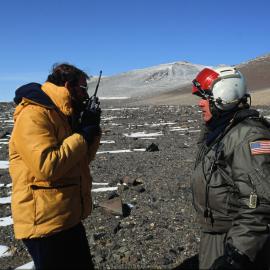 Dr Mike Isaac checks comms, Upper Wright Valley