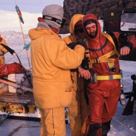 Diver getting into harness - Dellbridge Islands 