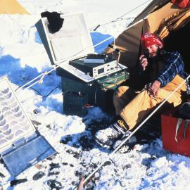 Chris Morris Using Solar Cell-Powered Radio