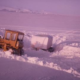 D4 Bulldozer Excavating a buried SnoCat