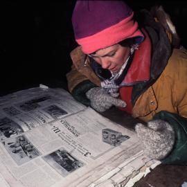 Tuppence Loe Reads "The Illustrated London News" in Shackleton's Hut